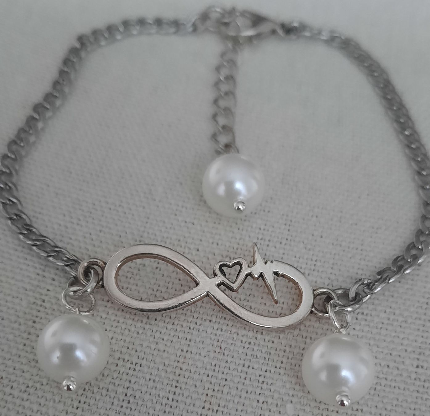 Armbänder & -reifen: Modisches Armband mit Unendlichkeitszeichen und Perlen – Neu (gemäss Beschreibung) aus Solothurn von lsc_pf99 5