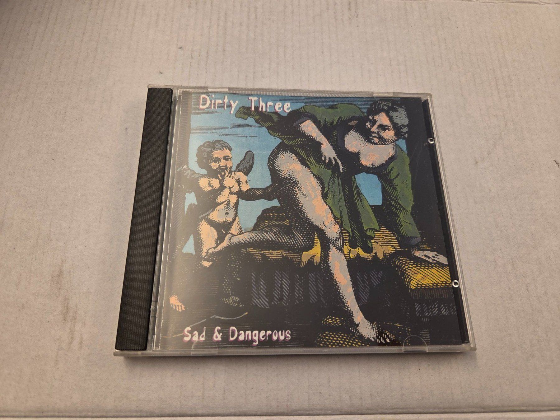 CD: DIRTY THREE - SAD & DANGEROUS – Usato da Bern venduto da Vinylsound.ch