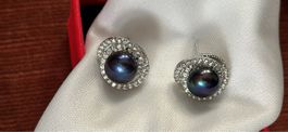 Puces d'oreilles élégantes avec perles noires scintillantes