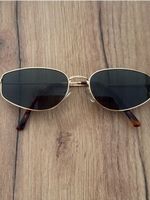 Elegante Sonnenbrille mit Goldrahmen - Zeitloser Klassiker