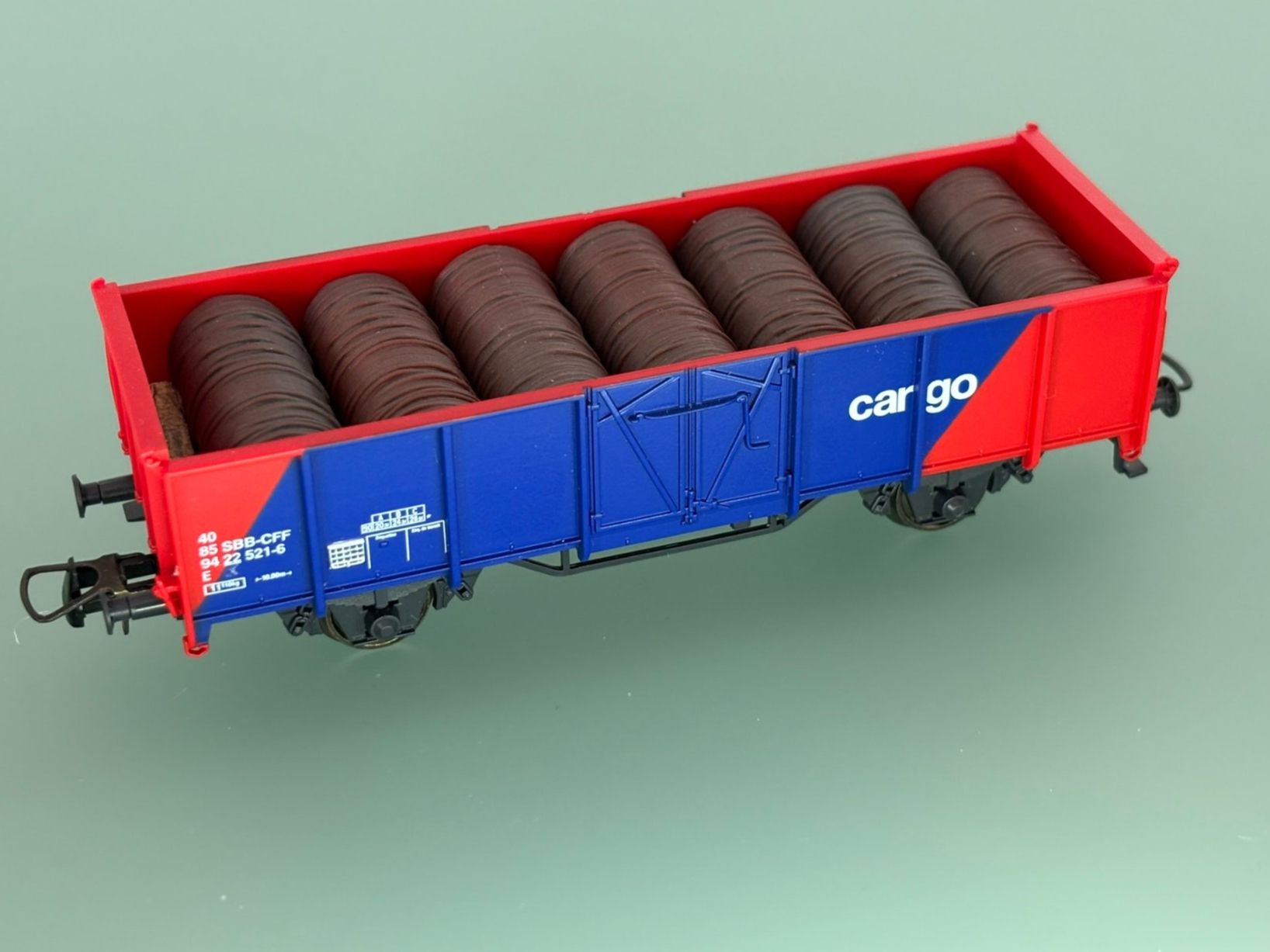 Roco Modellini di ferrovie: SBB CFF CARGO tombereau E chargé avec rouleaux – Usato da SION venduto da Pef12 6