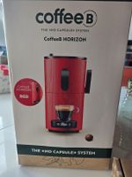 CoffeeB HORIZON Kapselmaschine Rot mit Kaffee Balls