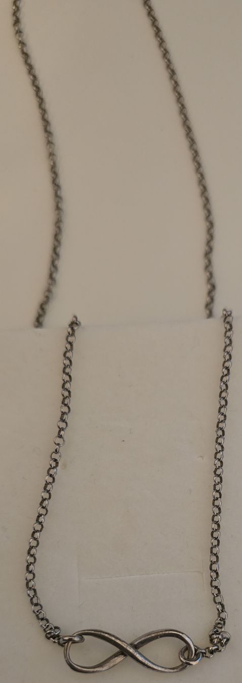 Catenine: Chaîne avec pendentif symbole infini  – Usato da Cugy VD venduto da CBO2020