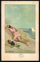 Frau am Strand mit Fotoapparat