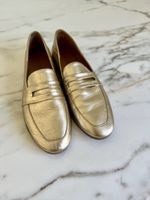 Woman’s Elegant Gold Leather Loafers