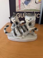 Statuette en porcelaine chats tigrés bon état