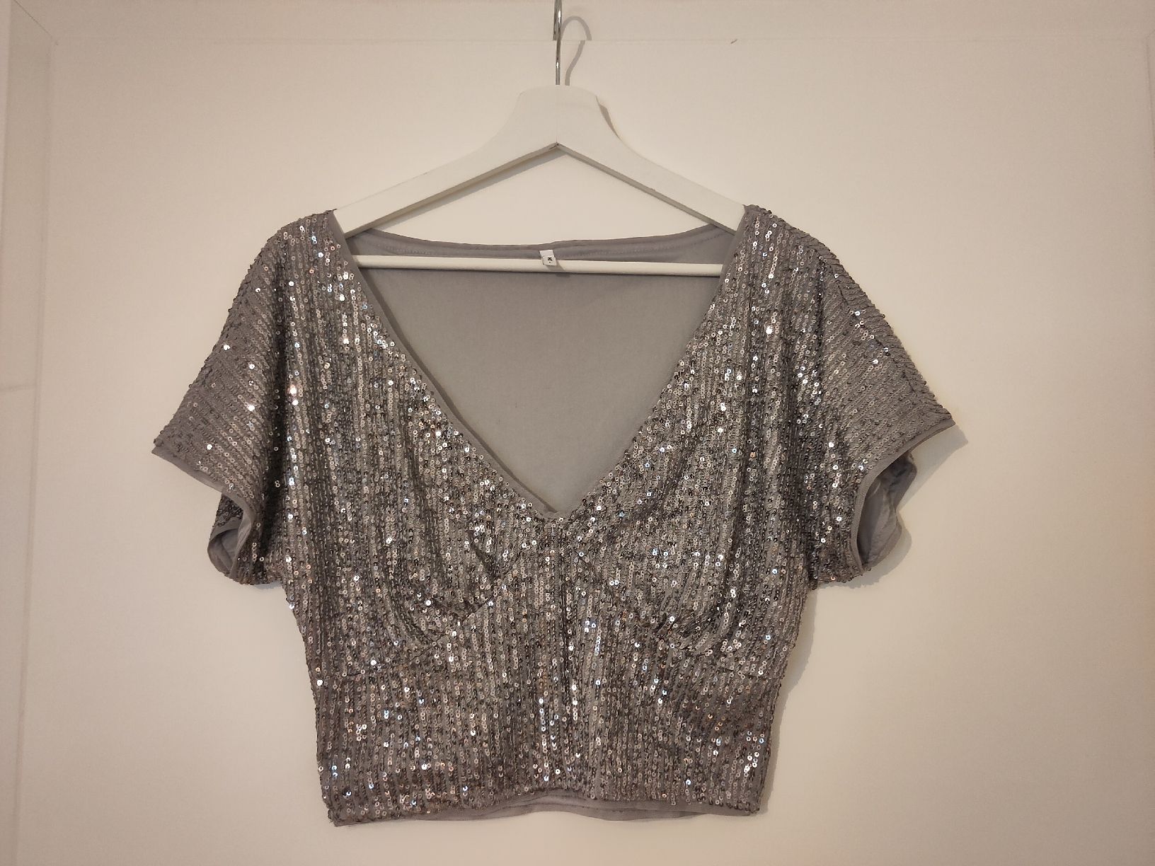 Top: Glitzer Top von ONLY, Silber, Grösse L – Usato da Bettlach venduto da Dkennis