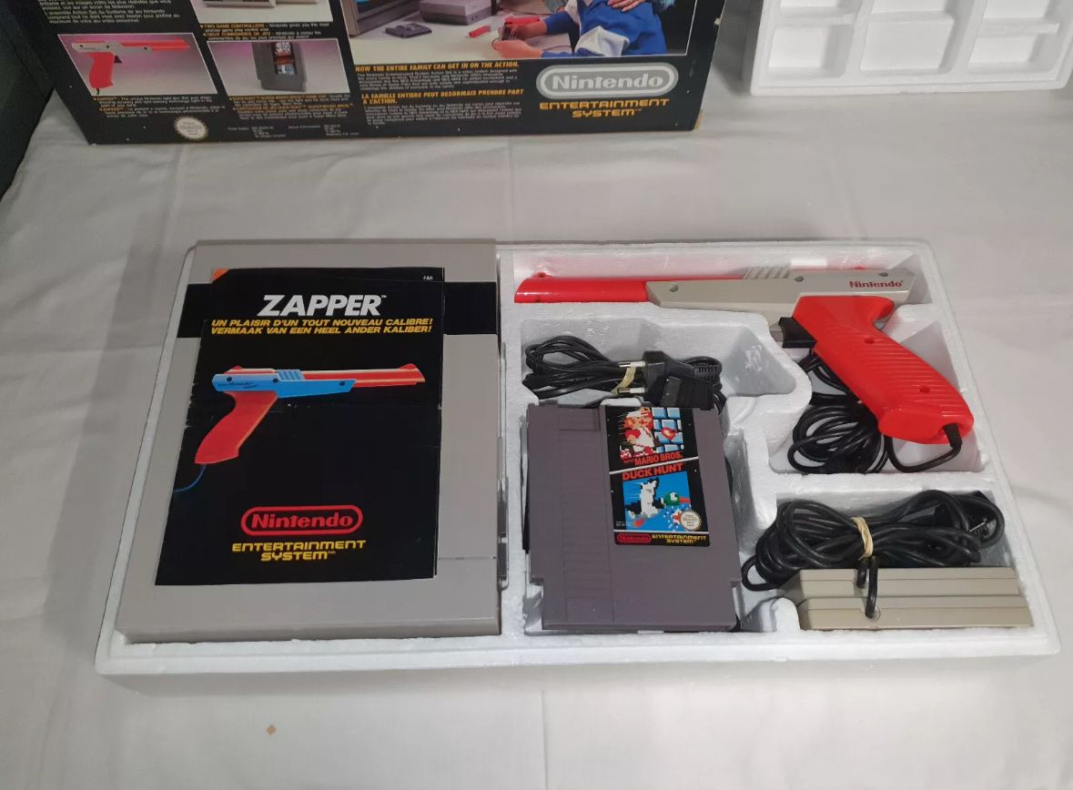 Nintendo Console: console nintendo nes pack action set en boite avec zapper – Usato da Lausanne venduto da sauvezretrogames 3