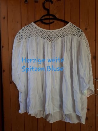 Schicke weisse Spitzenbluse mit V-Ausschnitt Gr. M