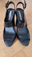 Elegante schwarze Melissa Sandalen aus duftendem PVC