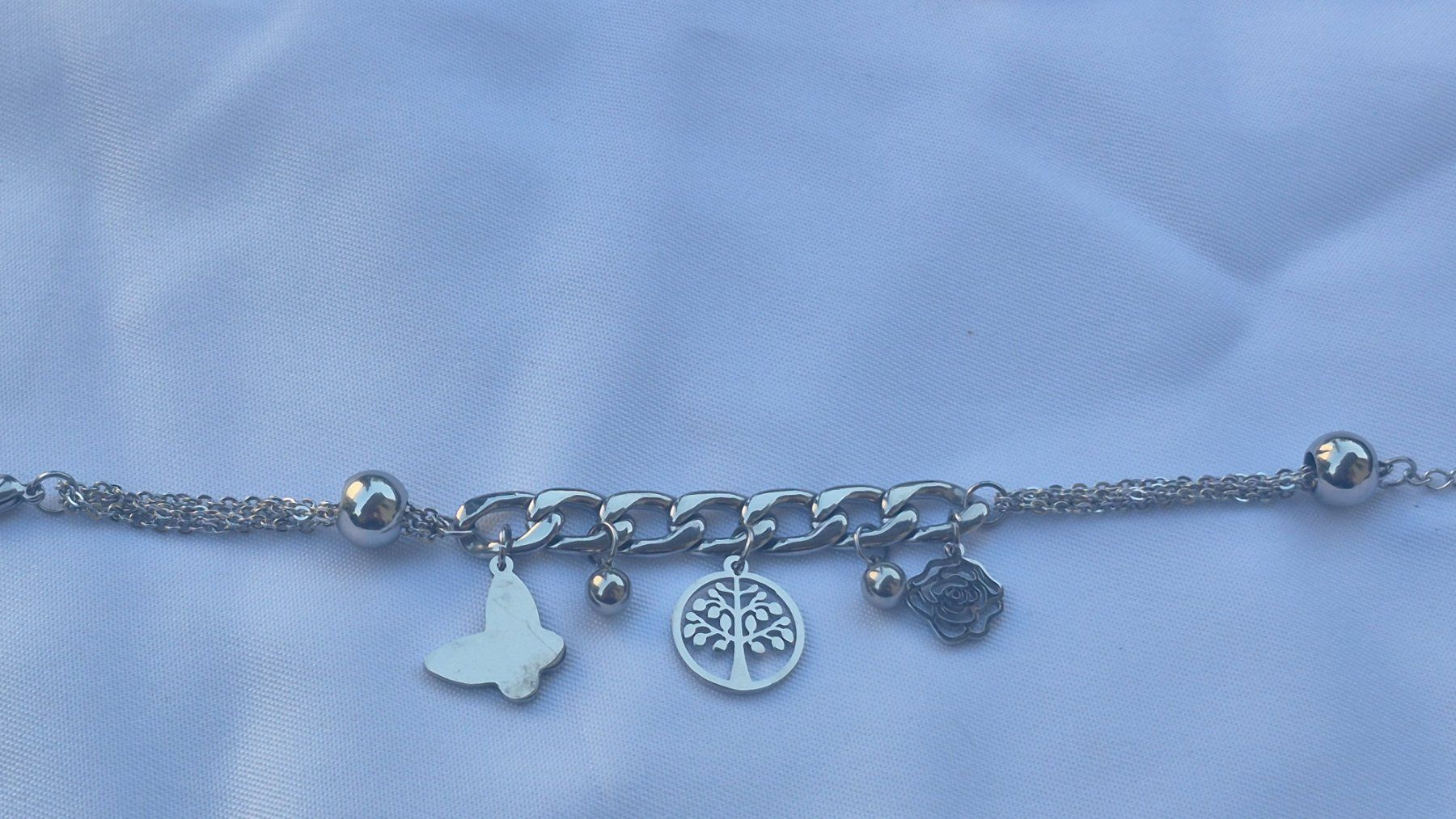 Bracciali & Braccialetti: Bracciale con ciondoli albero e farfalla – Usato da Giubiasco venduto da Stefaniav 6