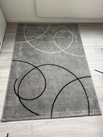 Tapis design gris moderne - Élégance et confort assurés