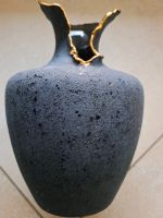 schöne dekorative Vase mit Goldrand