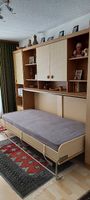 Schrankwand mit ausklappbarem Bett