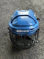Eishockeyhelm Bauer blau mit Gitter gebrauchter Zustand