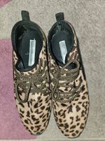 Sneaker in Leo Optik