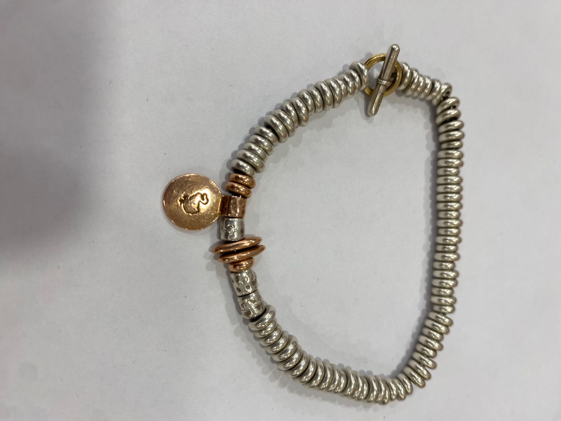 Pomellato Armbänder & -reifen: Bracelet s pomellato charm or rose dodo – Gebraucht aus La Neuveville von e_perriard