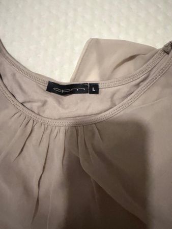 Top femme beige marque Cpm taille L état neuf