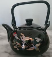 Antike Teekanne goldene Kraniche schwarz Porzellan