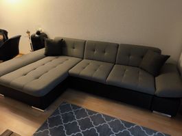 Ecksofa mit Schlaffunktion und Stauraum
