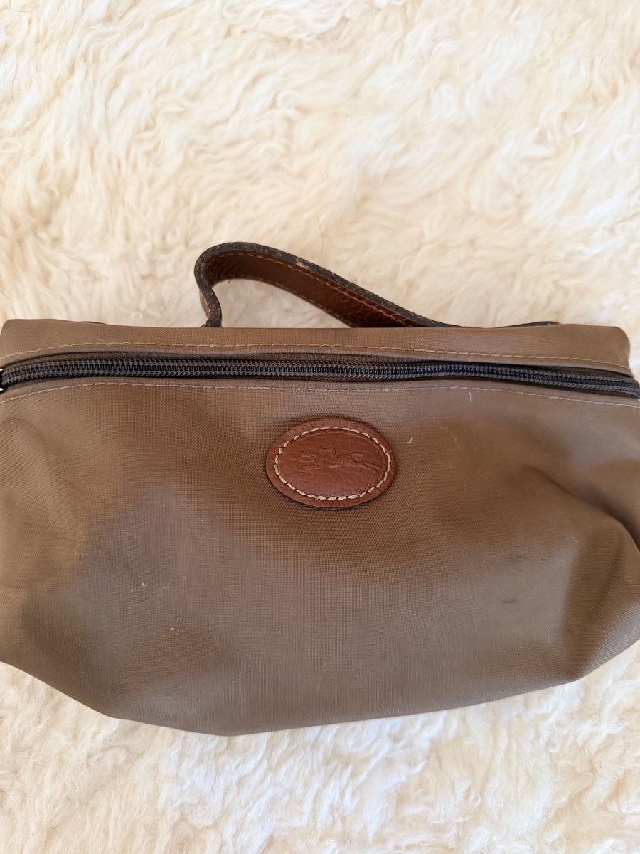 Longchamp Sacs femmes: Pochette Longchamp  – D'occasion à Lausanne par Meganelausanne