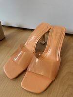 Sommerliche Sandalen mit klarem Absatz