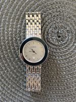 Montre Rado DiaStar cadran gris bracelet acier état bon