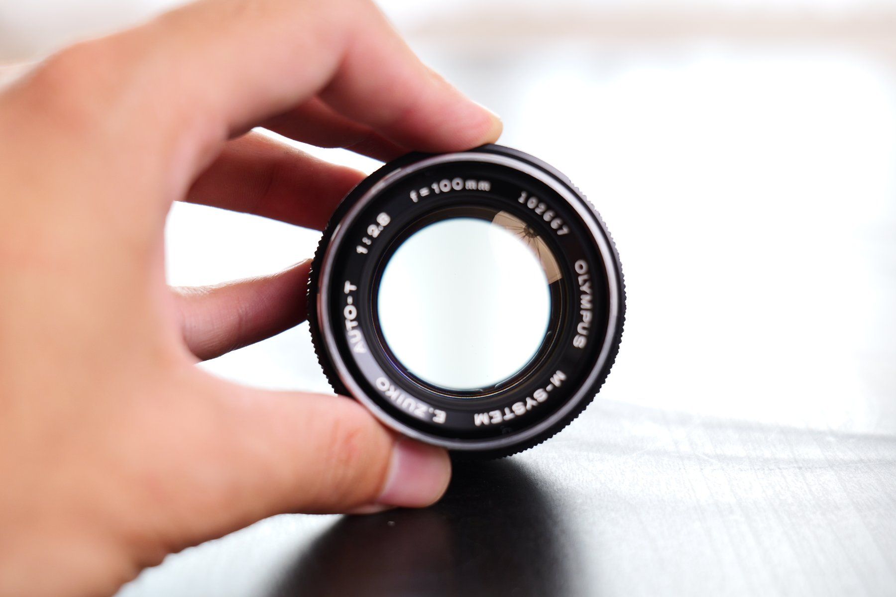Olympus Objectifs: Olympus OM Zuiko 100mm f2.8 – D'occasion à Tecknau par LevinLaufmann 3