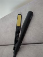 Fast neuen Haarglätter