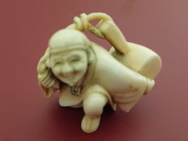 Antike Neksuke Japan  Mann mit Sack signiert