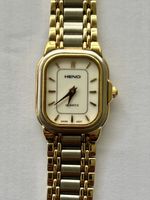 Élégante montre Heno Quartz vintage, ton or et argent
