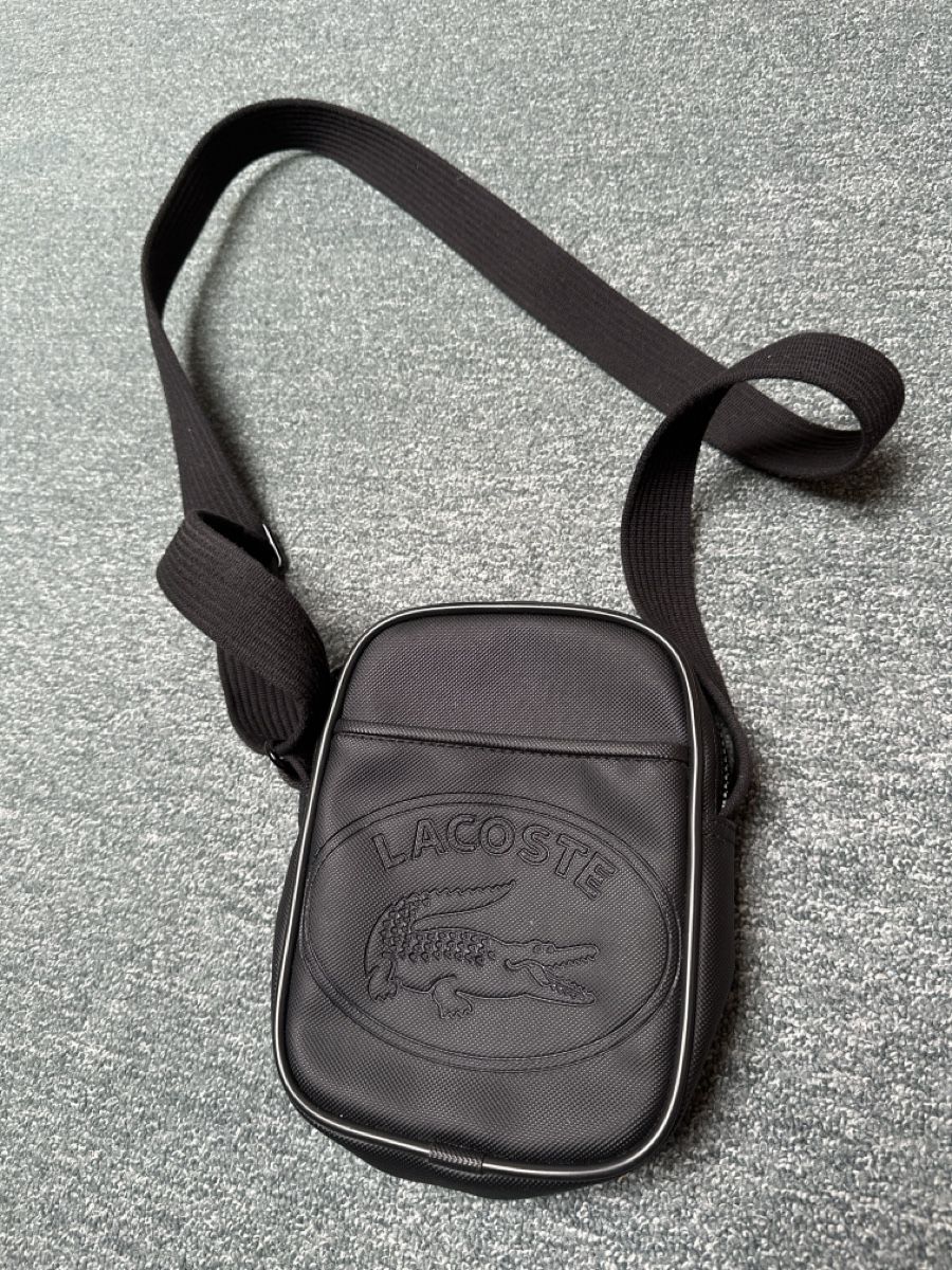 Lacoste Sacs: Umhängetasche Lacoste schwarz  – D'occasion à Baltschieder par YmroBe