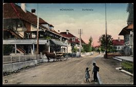 AK Münsingen, Straßenpartie mit Gasthaus und Pferdekutsche