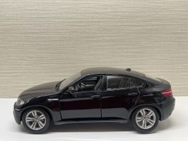 BMW X6 M Modellauto 1:18 von Burago, Sammlerstück Top!