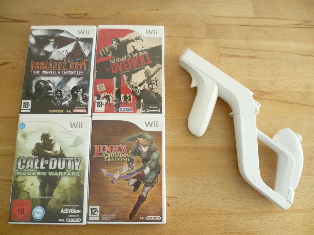 Nintendo Wii Zapper Light Gun + Remote + Nunchuk + 4 Games Kaufen auf