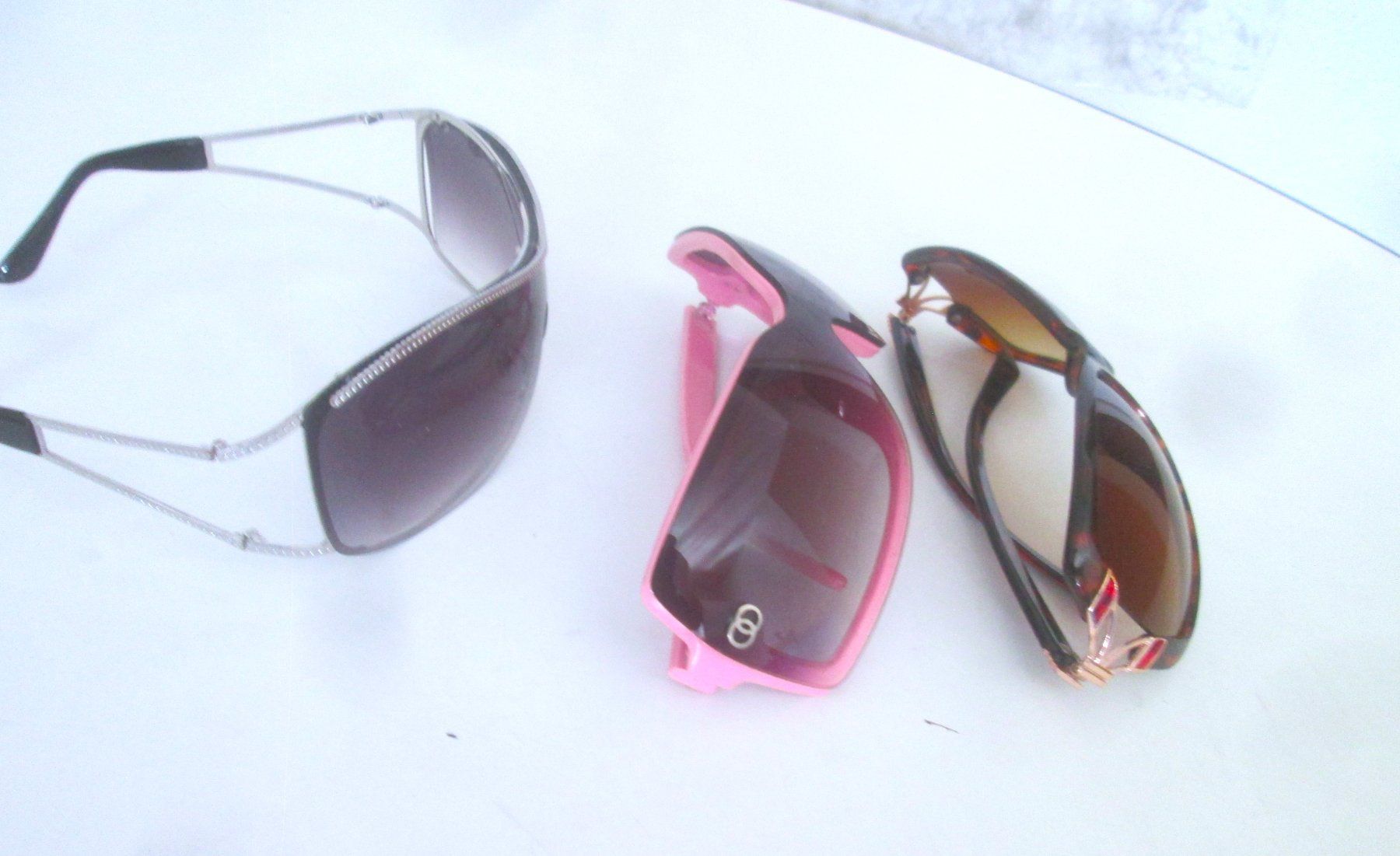 Lunettes & Verres: 3 Sonnenbrillen – D'occasion à Sementina par babucia 1