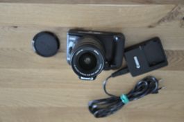 Canon EOS 1000D Digitalcamera mit Objektiv und Zubehör