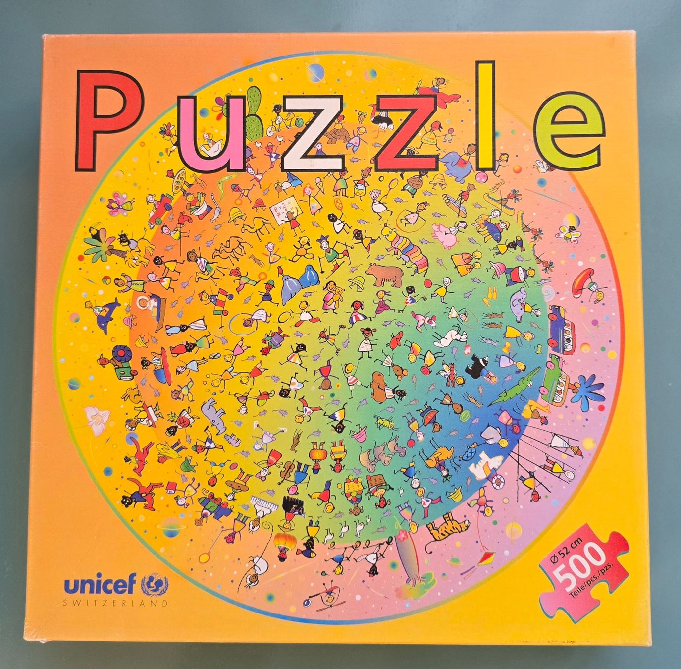 Puzzle: Puzzle rund 500  UNICEF  2003 – Usato da Rheinau venduto da MakalekaAloha 2