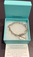 Tiffany & Co. NY Round Wavy Tag Sterling Silber Armband