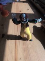 NECA 6inch figure of Pennywise from It.