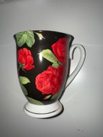 Schöne Teetasse mit Rosenmuster