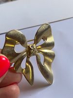 Jolie broche dorée