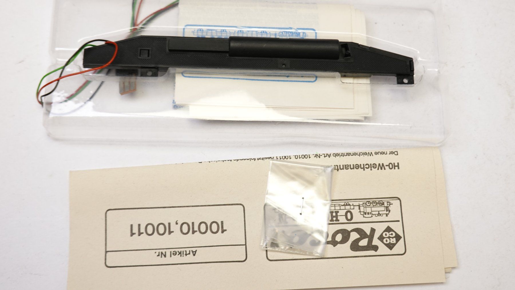 Roco Modellini di ferrovie: e8 Roco 10010 Weichenantrieb links – Usato da Thun venduto da evinka_gmbh 2