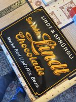 Plaque émaillée Lindt & Sprüngli noir bon état