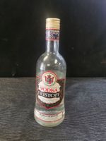 ANCIENNE BOUTEILLE DE VODKA ERISTOFF ENTAMÉE