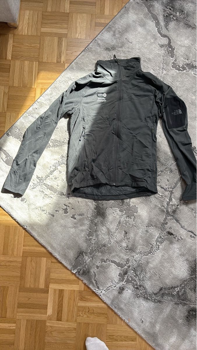 North Face Giacche: #5- Dunkelgraue Softshell Jacke Team Security Champion Gr.M – Usato da Aesch BL venduto da OgFits