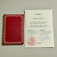 Carnet de garantie bijoux Cartier + certificat authentique.