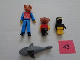 3 Lego Figuren und 1 Delfin