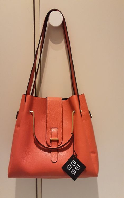 Sac main bandouli re neuf Lucca Baldi cuir orange Acheter