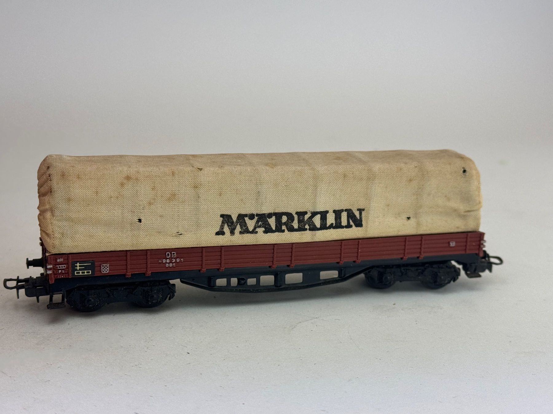Märklin Modellini di ferrovie: EX-  Märklin Flachbordwagen mit Plane 4517 – Usato da Elm venduto da Wikmtz